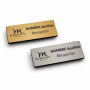 Identificadores magnéticos rectangulares en acabado dorado y plateado